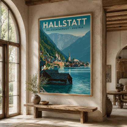 A framed travel poster of Hallstatt, Salzburgmergut - Austria, displayed on a beige plaster wall in a rustic, sunlit room with a wooden bench and arched windows.